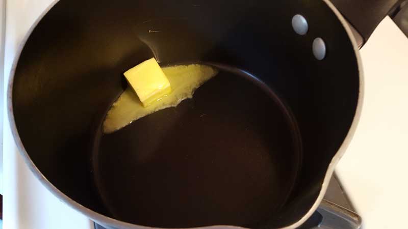 Butter melting in a pot.