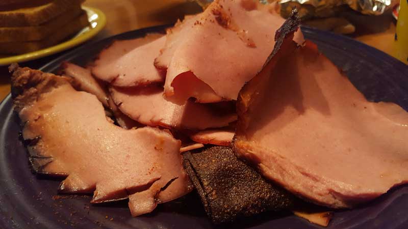 Sliced barbecued bologna.