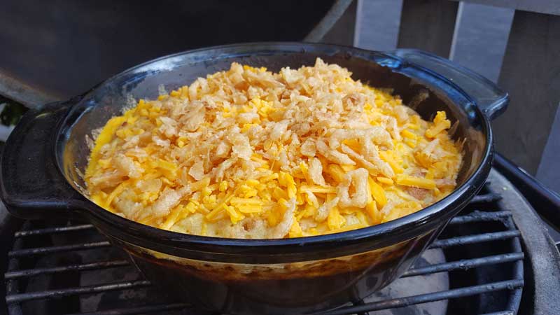 Casserole covered in cheese and French fried onions.