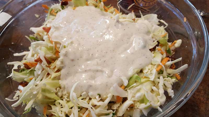 Dressing on the cole slaw ingredients.