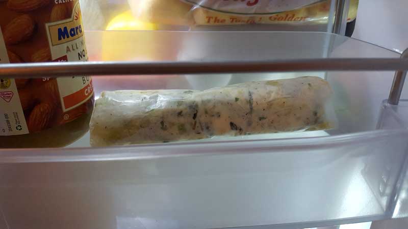 Rolled butter mixture in the refrigerator.