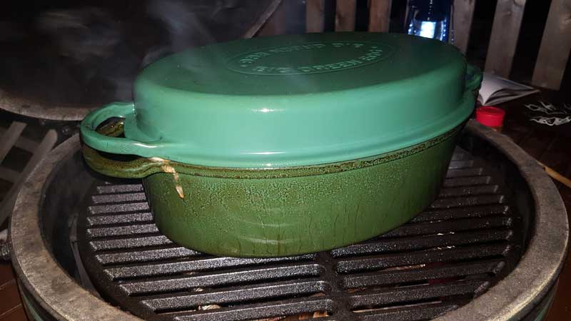 Covered Dutch oven on the Big Green Egg.