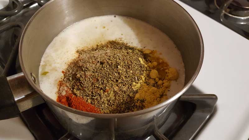 Spices in a butter mixture.