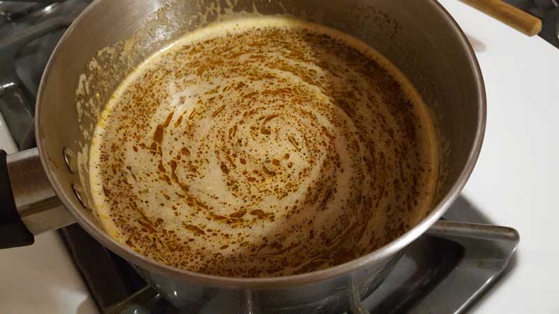 Creole butter mixture in a pot.