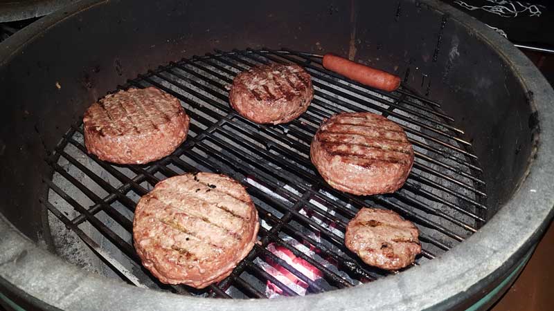 Cooked stuffed burgers on the Big Green Egg.