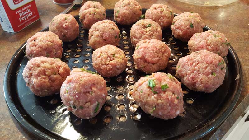 15 meatballs on a perforated grid.
