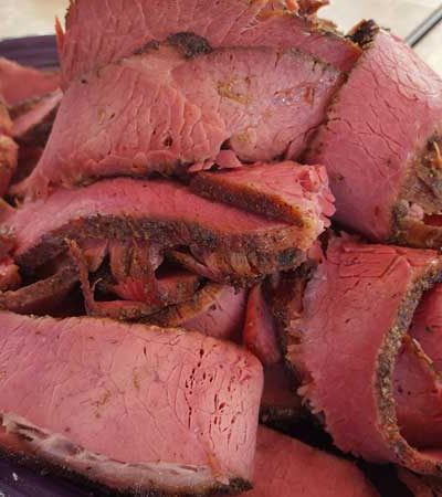 Plate of sliced pastrami.