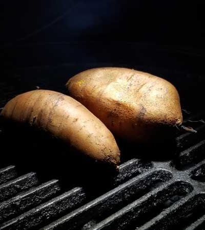 Sweet potatoes cooking on the Big Green Egg.