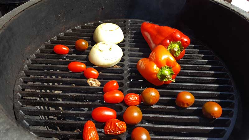 Onion, tomatoes, and pepper on the Big Green Egg.