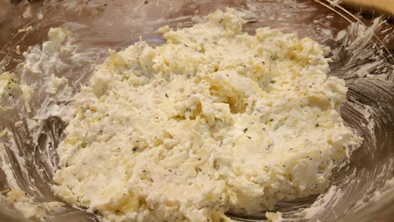 Onion and garlic mixed into the cheese mixture.