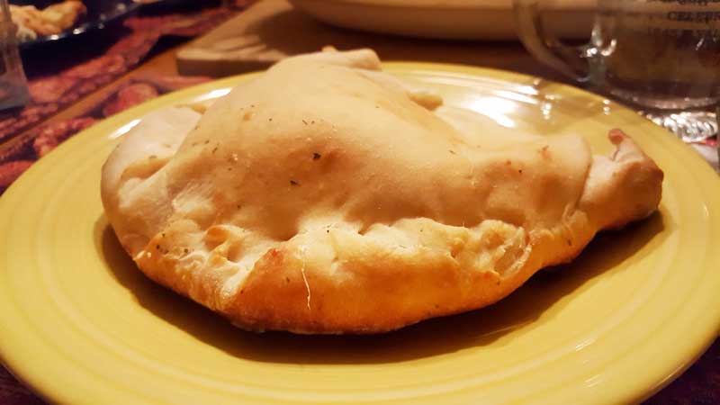 Calzone on a plate.