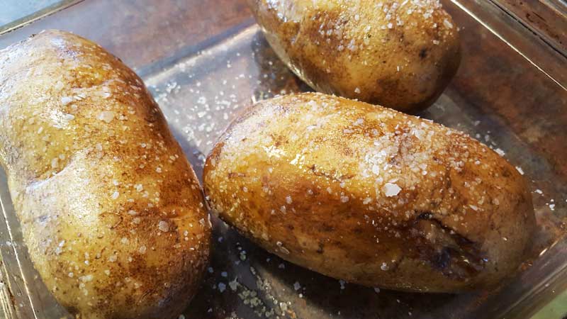 Potatoes  brushed with oil and salt.