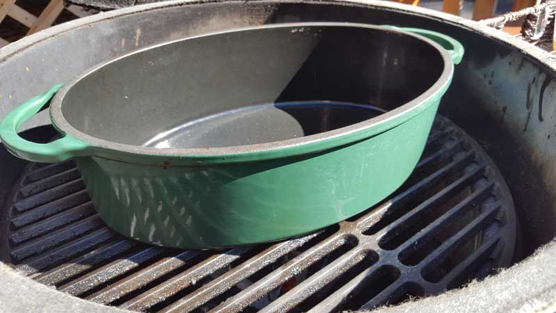 Dutch Oven being preheated on a Big Green Egg.